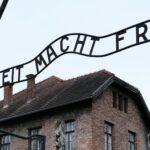 Work will set you free sign at concentration camp